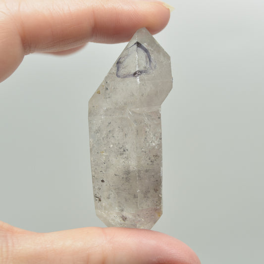 Fluid Inclusion / Enhydro Raw Quartz Point - with moving black sand - 39 grams - 1 Count
